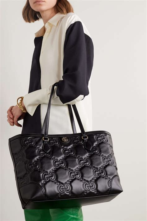 805050823 gucci tote|Medium GG tote bag in black GG leather .